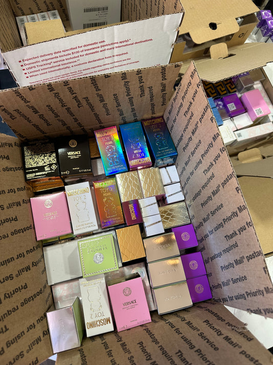 Mini perfume 100 piezas